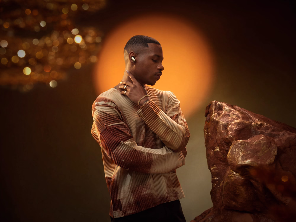 Man wearing Bose QuietComfort Ultra Earbuds (2nd Gen).