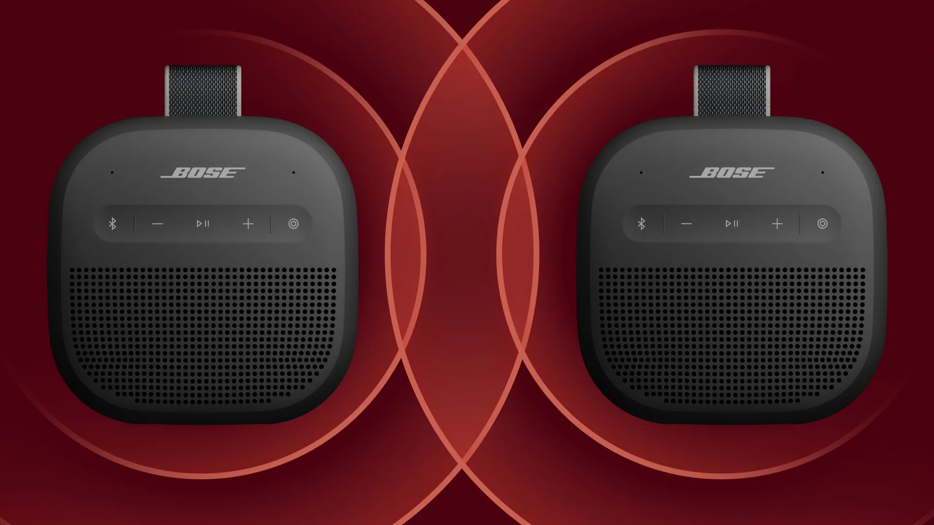 Two Bose SoundLink Micro Portable Speakers (2nd Gen) simulating pairing.